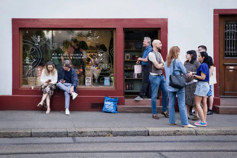 People having fun, spilling out of Cozy place