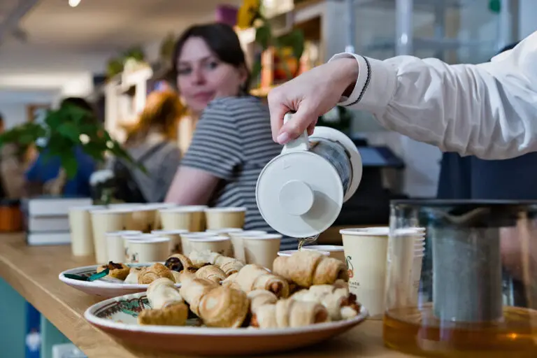Serving snacks at the grand opening