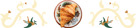 Decorative divider showing a croissant on a Kosiv ceramic plate