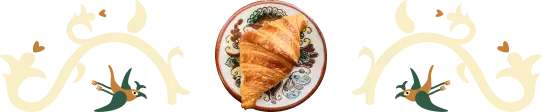 Decorative divider showing a croissant on a Kosiv ceramic plate